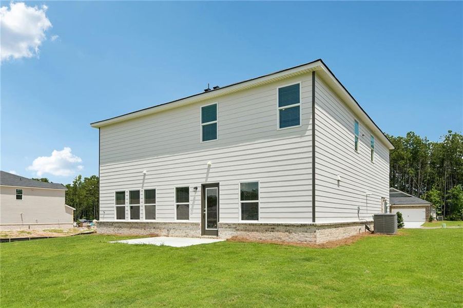 Exterior details and patio area of a home in Parkside at Grayson, Grayson (Image 28).