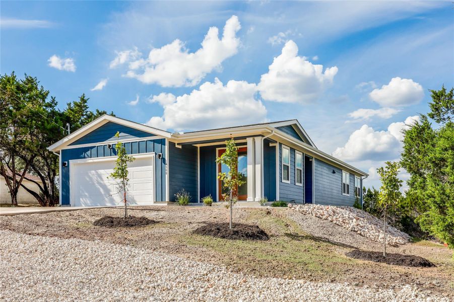 Front exterior of a new home in , Lago Vista, TX, highlighting curb appeal (Image 22).
