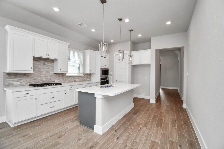 Furnished interior view inside a new home in Arabella on the Prairie: Signature Collection, Richmond (Image 10).