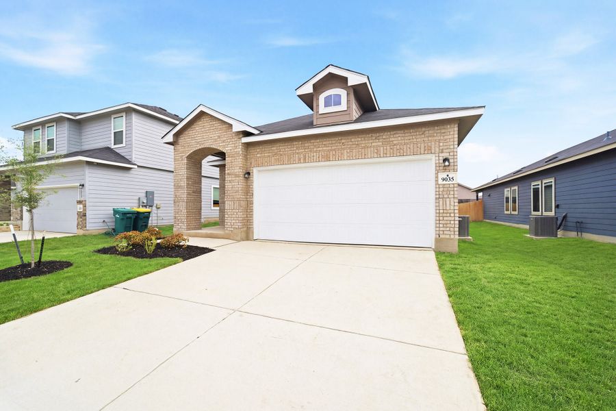 Front exterior of a new home in Notting Hill, Converse, TX, highlighting curb appeal (Image 18).