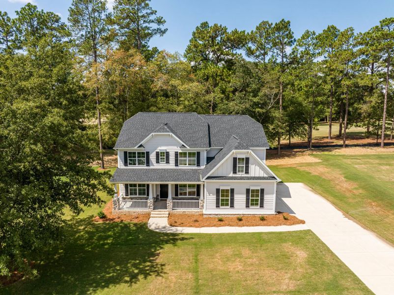 Front exterior of a new home in The Village at Horse Creek, Graniteville, SC, highlighting curb appeal (Image 2). Front exterior of a new home in The Village at Horse Creek, Graniteville, SC, highlighting curb appeal (Image 2).