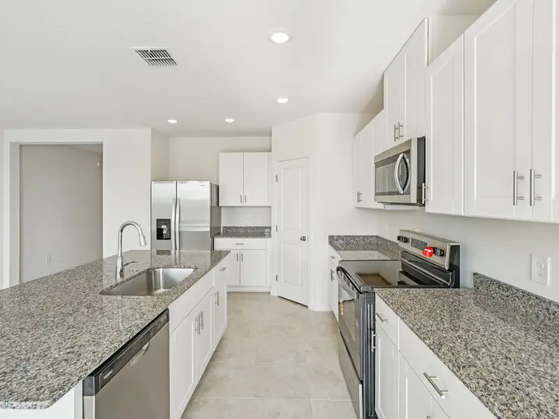 Furnished interior view inside a new home in Wynnstone - Signature Series, Davenport (Image 3).