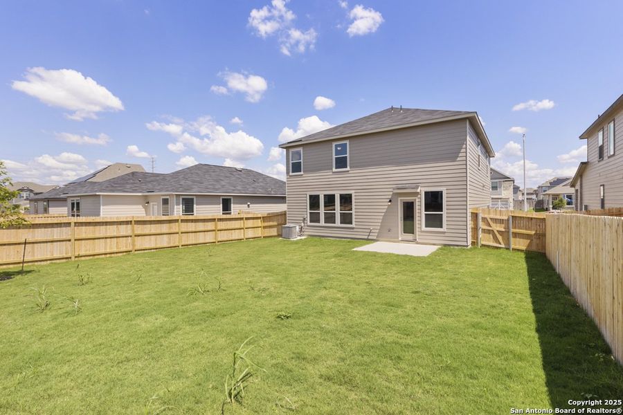 Front exterior of a new home in Woodside Farms, Seguin, TX, highlighting curb appeal (Image 16). Front exterior of a new home in Woodside Farms, Seguin, TX, highlighting curb appeal (Image 16).