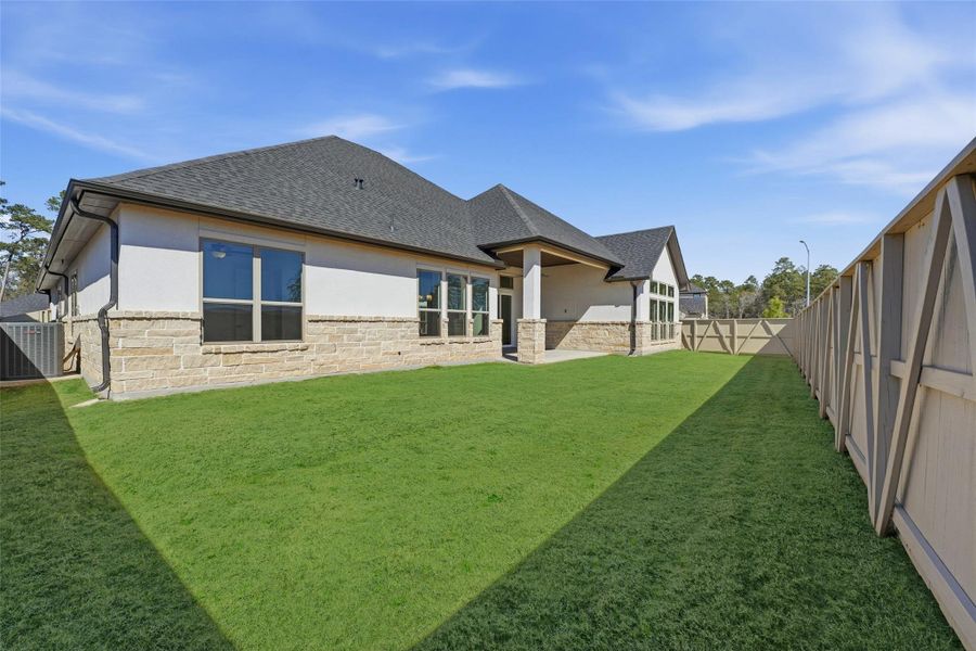 Exterior details and patio area of a home in Audubon 80’s, Magnolia (Image 4).