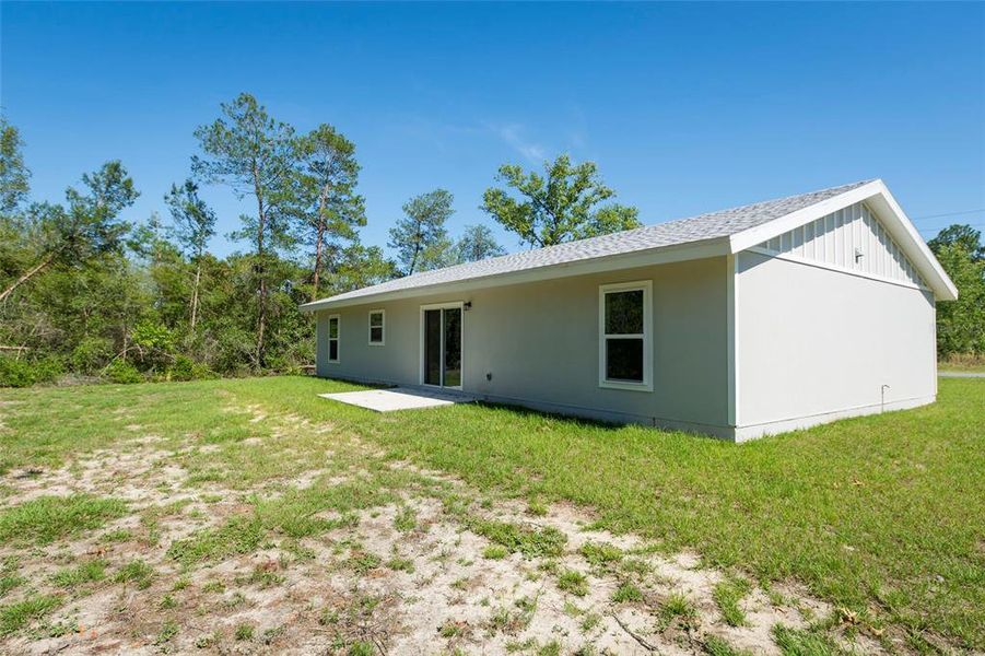 Front exterior of a new home in , Ocala, FL, highlighting curb appeal (Image 1).
