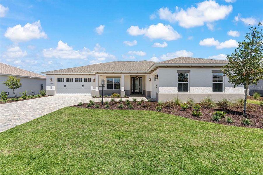 Front exterior of a new home in , Ocala, FL, highlighting curb appeal (Image 20). Front exterior of a new home in , Ocala, FL, highlighting curb appeal (Image 20).