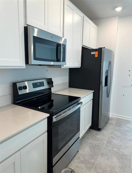 Furnished interior view inside a new home in , Davenport (Image 5).