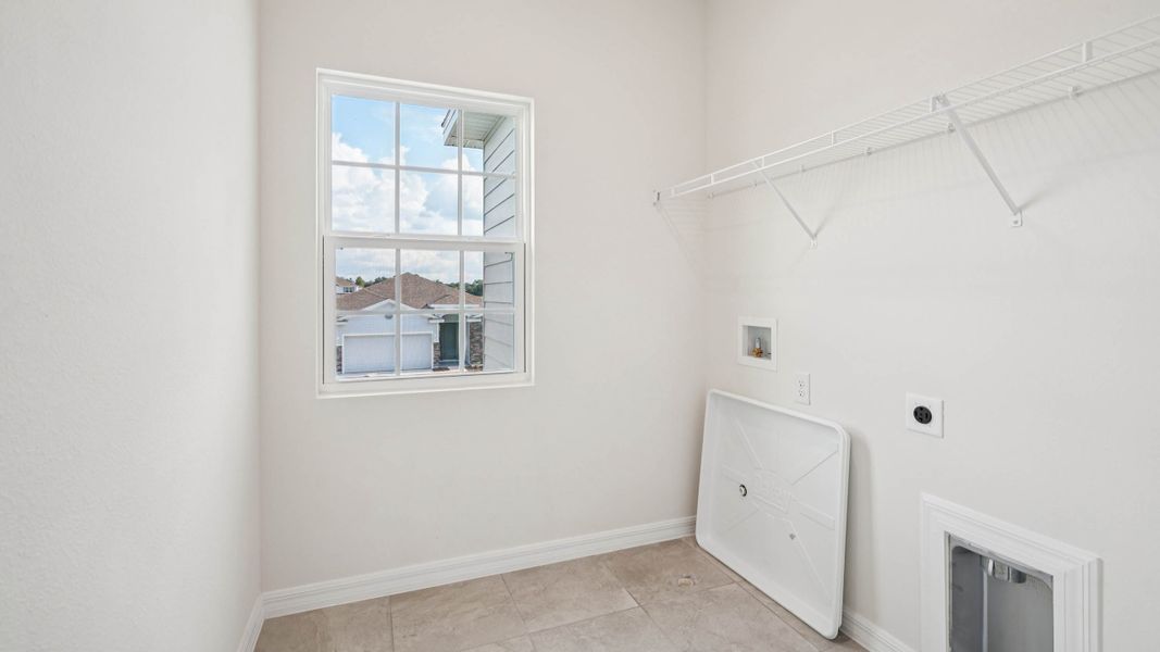 Representative unfurnished interior of a home built from the Coral by D.R. Horton in Oaks Preserve, Gainesville (Image 24).