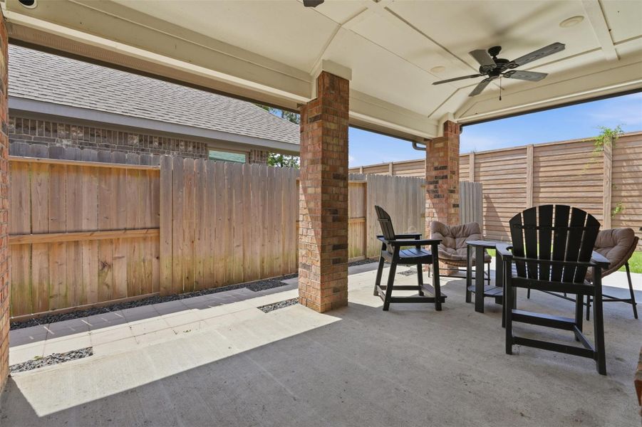 Covered patio with ceiling fans—perfect for relaxing or entertaining year-round. Covered patio with ceiling fans—perfect for relaxing or entertaining year-round.