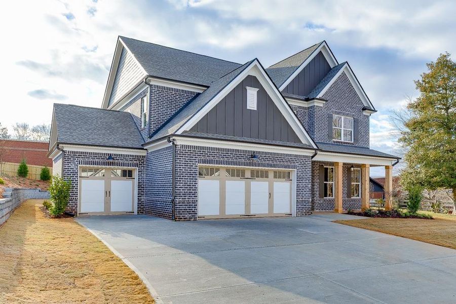 Front exterior of a new home in , Buford, GA, highlighting curb appeal (Image 25). Front exterior of a new home in , Buford, GA, highlighting curb appeal (Image 25).