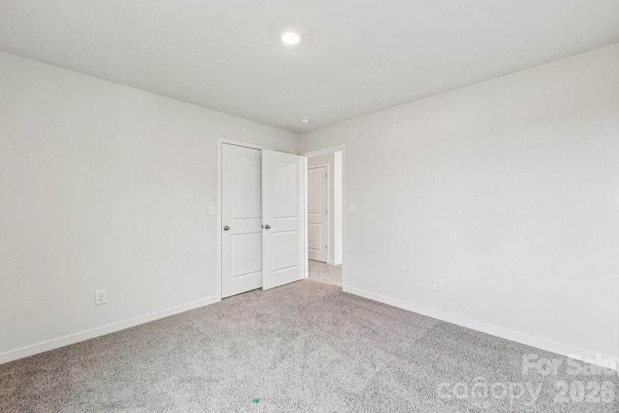 Spacious, unfurnished interior of a new home in Reedy Creek Preserve, Charlotte (Image 17).