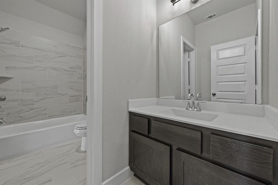 Furnished interior view inside a new home in COLTON®, Todd Mission (Image 16).