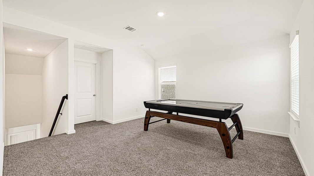 Representative furnished interior of a home built from the Jasmine by D.R. Horton in Holly Ridge, Rosenberg (Image 20).