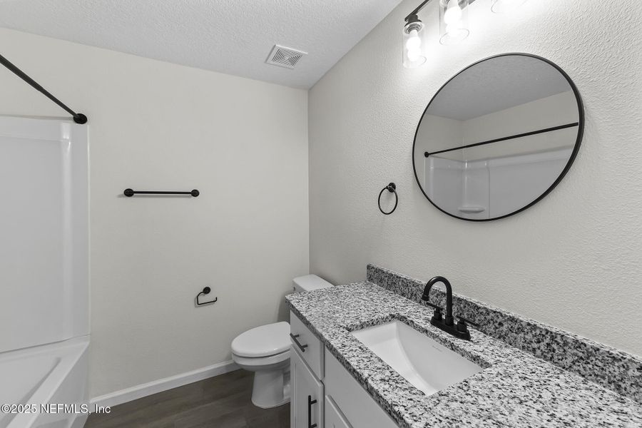 Furnished interior view inside a new home in , Jacksonville (Image 9). Furnished interior view inside a new home in , Jacksonville (Image 9).