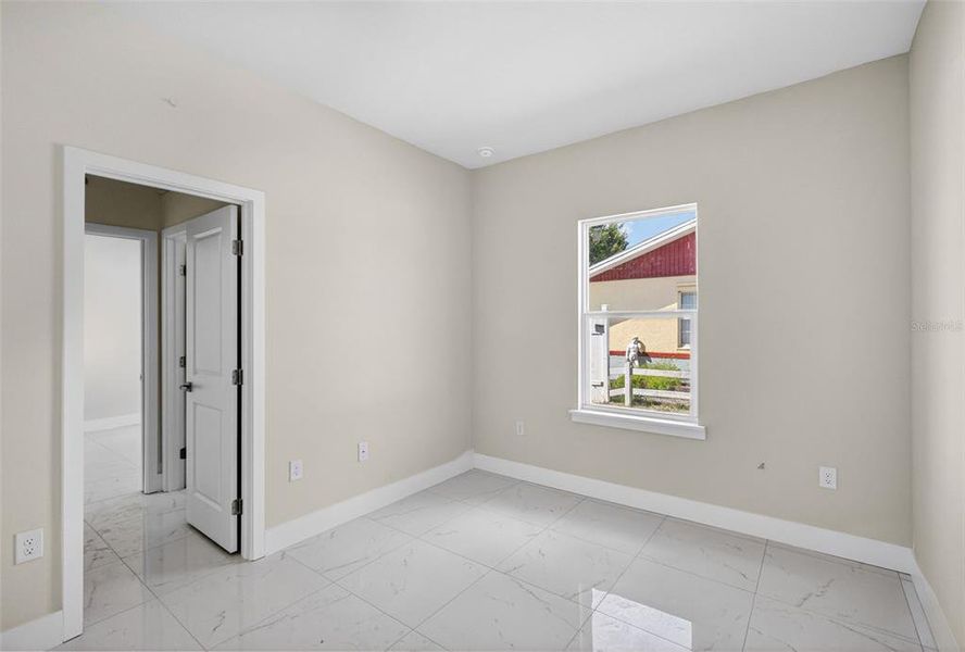 Spacious, unfurnished interior of a new home in , Port Charlotte (Image 32).