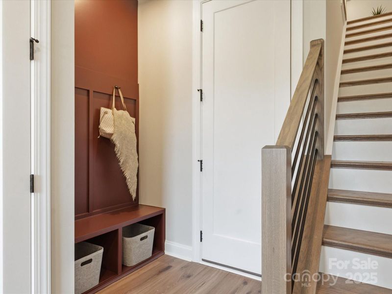 Built-In Drop Zone at Garage Entry Adds Convenience. *Model Photos | Actual Finishes, Structural Selections, and Orientation May Vary.