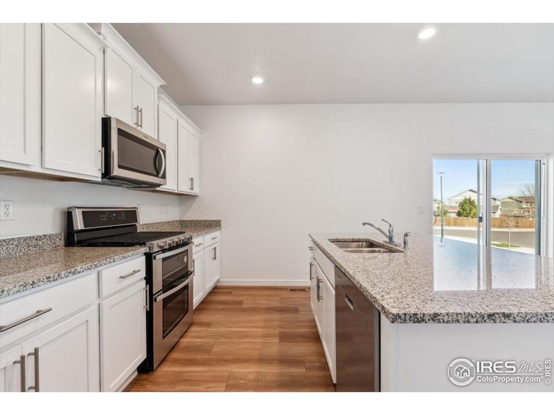 Furnished interior view inside a new home in Silver Peaks, Lochbuie (Image 10).