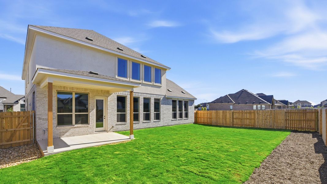 Exterior details and patio area of a home in Hawkes Landing, Leander (Image 3).