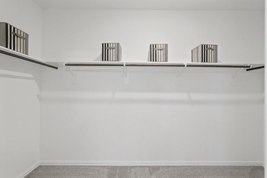 This closet is where your personal style flourishes, and every day starts with a little extra inspiration. Welcome to a space that feels not just like storage, but like a true extension of who you are.