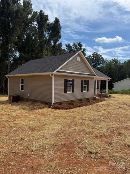 Exterior details and patio area of a home in , York (Image 8).