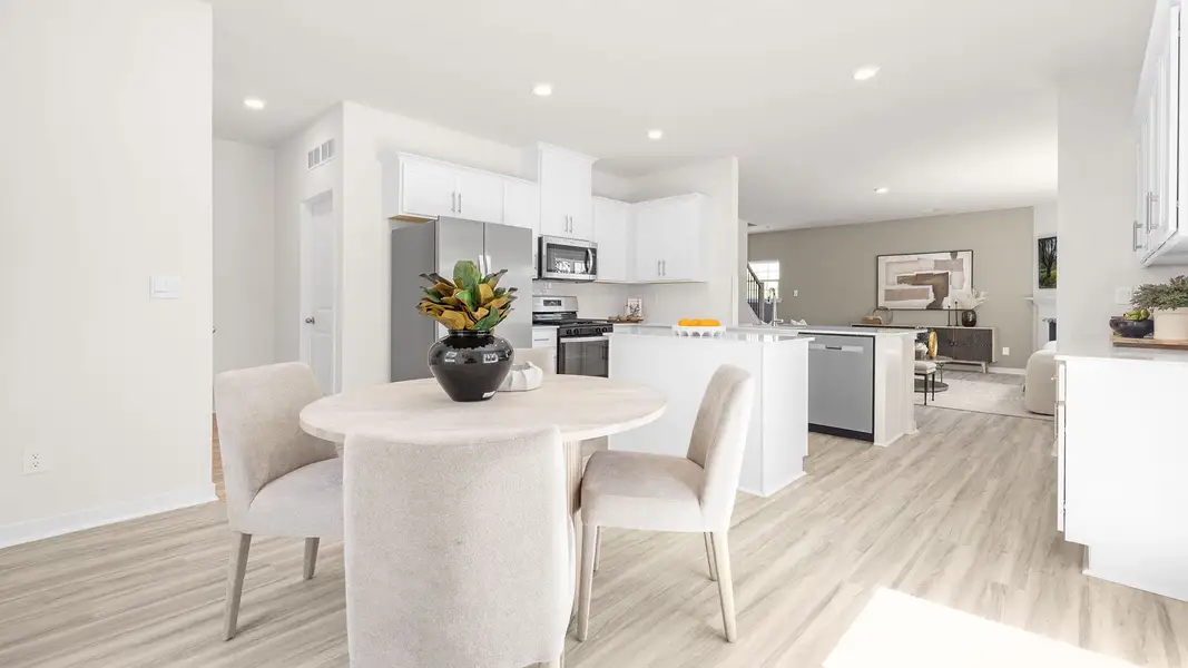 Furnished interior view inside a new home in Tap Root Farms, Fletcher (Image 4).