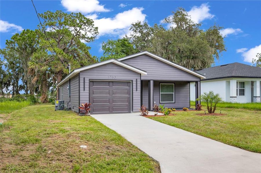 Front exterior of a new home in , Sanford, FL, highlighting curb appeal (Image 2). Front exterior of a new home in , Sanford, FL, highlighting curb appeal (Image 2).