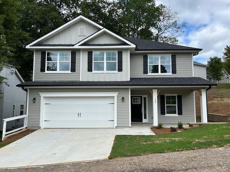 Front exterior of a new home in Habersham Meadows, Demorest, GA, highlighting curb appeal (Image 2).