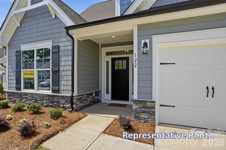 Exterior details and patio area of a home in Enclave at Riverdale, Huntersville (Image 3).