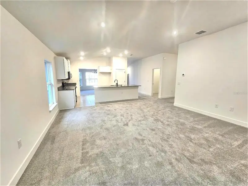 Spacious, unfurnished interior of a new home in Harmony Central, St. Cloud (Image 8). Spacious, unfurnished interior of a new home in Harmony Central, St. Cloud (Image 8).