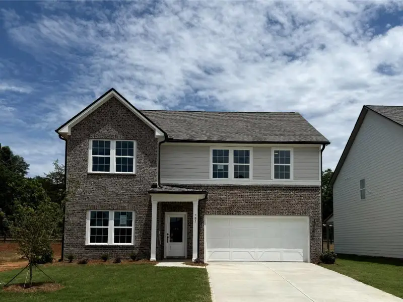 Front exterior of a new home in Langston Reserve, Cartersville, GA, highlighting curb appeal (Image 21). Front exterior of a new home in Langston Reserve, Cartersville, GA, highlighting curb appeal (Image 21).