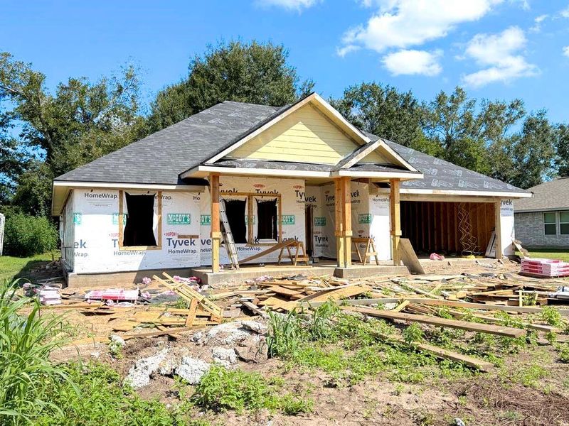Front exterior of a new home in , Brazoria, TX, highlighting curb appeal (Image 1). Front exterior of a new home in , Brazoria, TX, highlighting curb appeal (Image 1).