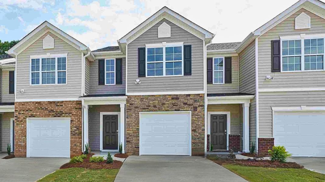 Front exterior of a new home in Henley Ridge, Graham, NC, highlighting curb appeal (Image 1).