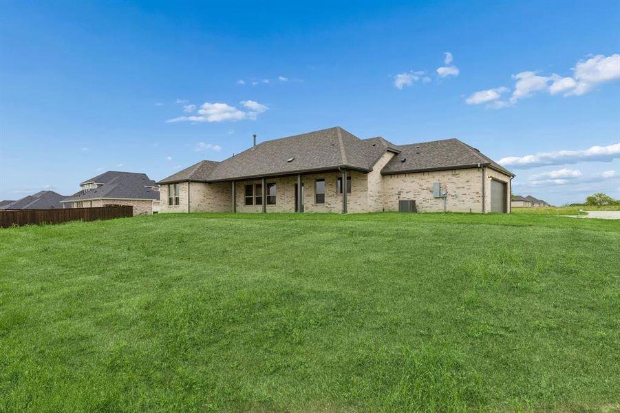 Exterior details and patio area of a home in Ellis Ranch Estates, Waxahachie (Image 19).