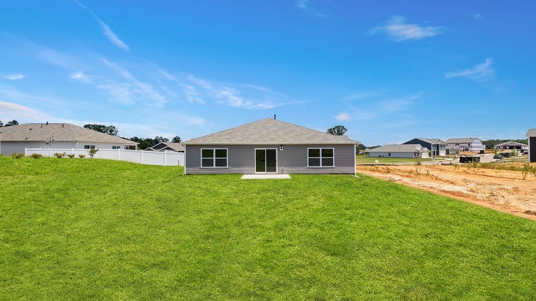 Exterior details and patio area of a home in Treemont Commons, Wellford (Image 2).
