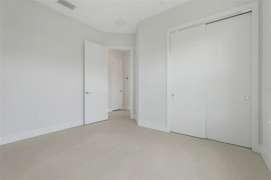 Spacious, unfurnished interior of a new home in Toscana, Palm Coast (Image 18).