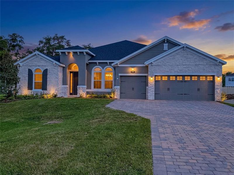 Front exterior of a new home in Francisco Park, Oviedo, FL, highlighting curb appeal (Image 20).