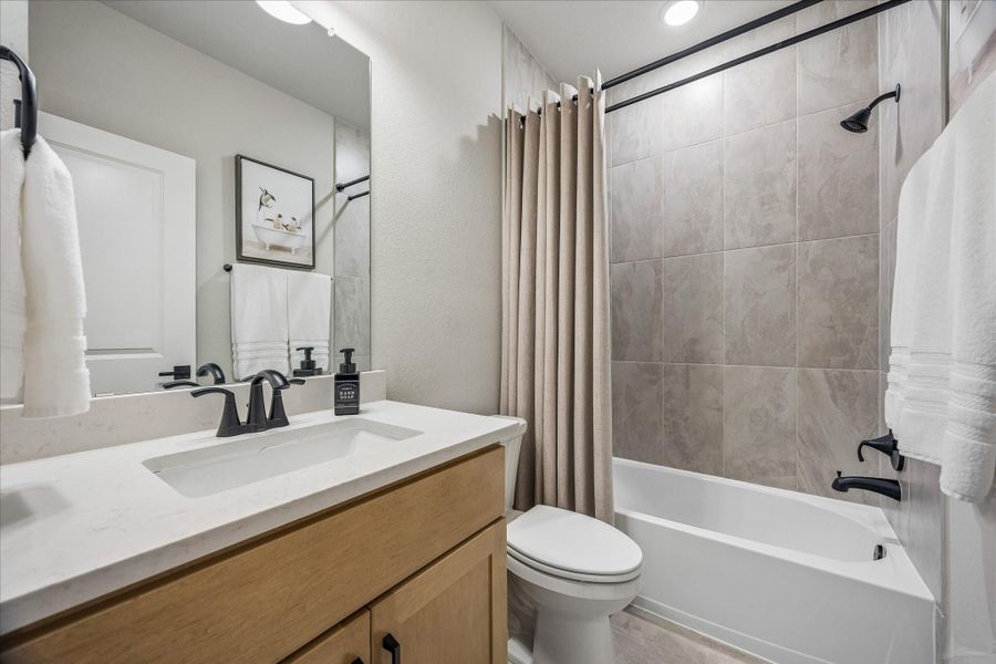 Furnished interior view inside a new home in Prairieland Village - Summit Collection, Cypress (Image 10).