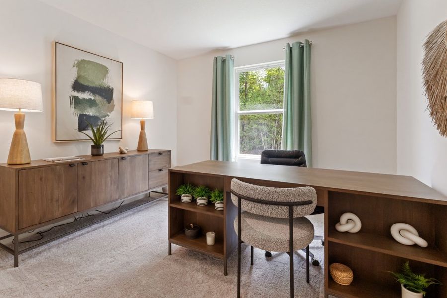 A room with a desk and chairs. A room with a desk and chairs.