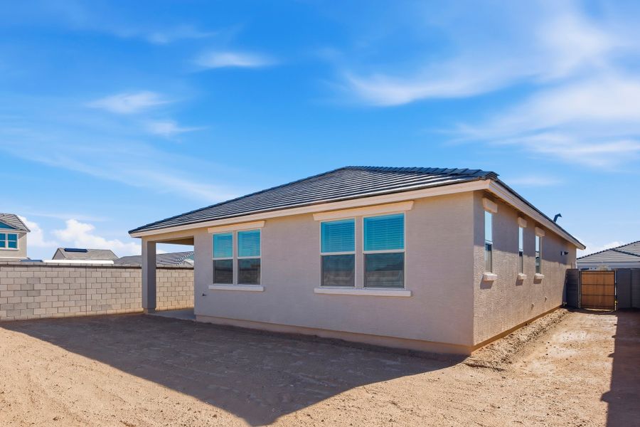 Exterior details and patio area of a home in Montana Vista - Highland, Buckeye (Image 3).
