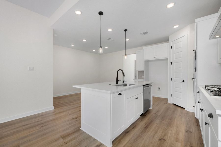 Furnished interior view inside a new home in Flora, Hutto (Image 12).