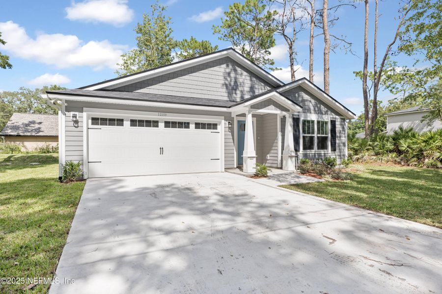 Front exterior of a new home in , Jacksonville, FL, highlighting curb appeal (Image 2). Front exterior of a new home in , Jacksonville, FL, highlighting curb appeal (Image 2).