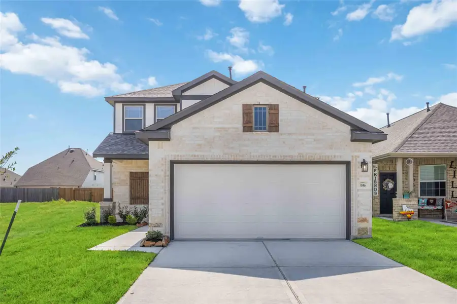 Front exterior of a new home in Bluebonnet Village, Bellville, TX, highlighting curb appeal (Image 2). Front exterior of a new home in Bluebonnet Village, Bellville, TX, highlighting curb appeal (Image 2).