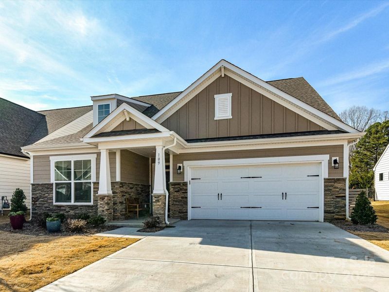 Front exterior of a new home in , Mooresville, NC, highlighting curb appeal (Image 24).