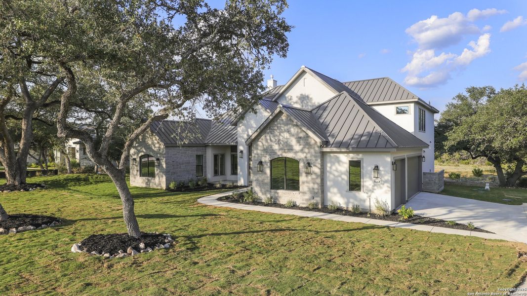 Front exterior of a new home in , New Braunfels, TX, highlighting curb appeal (Image 27).