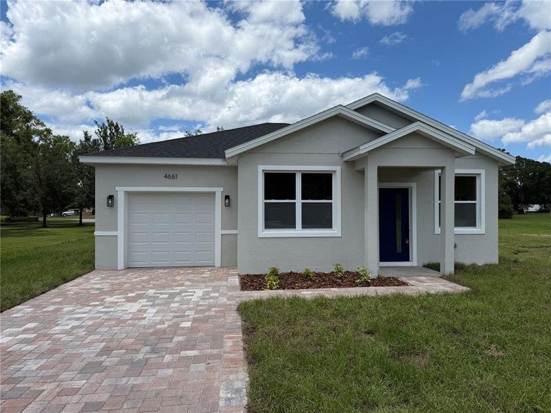 Front exterior of a new home in , St. Cloud, FL, highlighting curb appeal (Image 2). Front exterior of a new home in , St. Cloud, FL, highlighting curb appeal (Image 2).