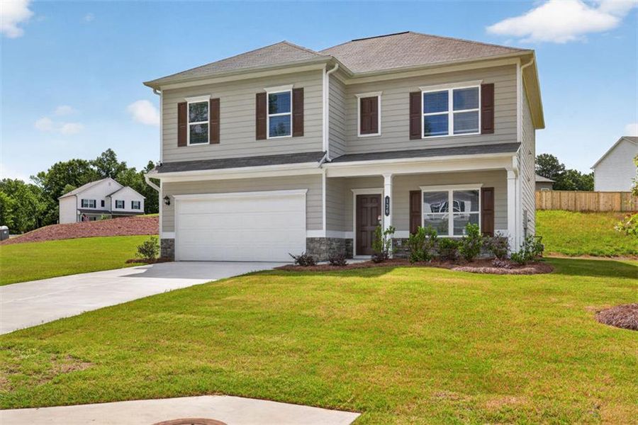 Front exterior of a new home in Jones Ridge, Dallas, GA, highlighting curb appeal (Image 1). Front exterior of a new home in Jones Ridge, Dallas, GA, highlighting curb appeal (Image 1).