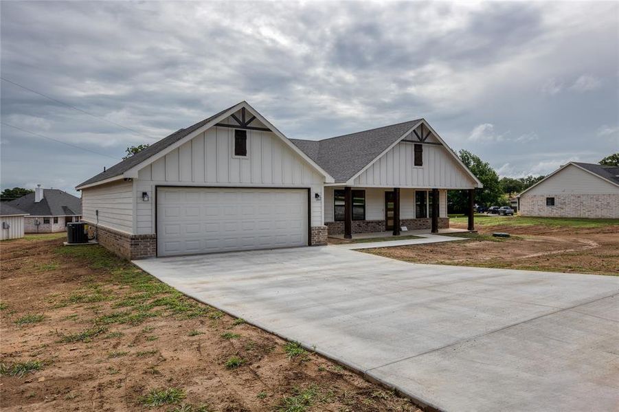 Front exterior of a new home in , Jacksboro, TX, highlighting curb appeal (Image 18).