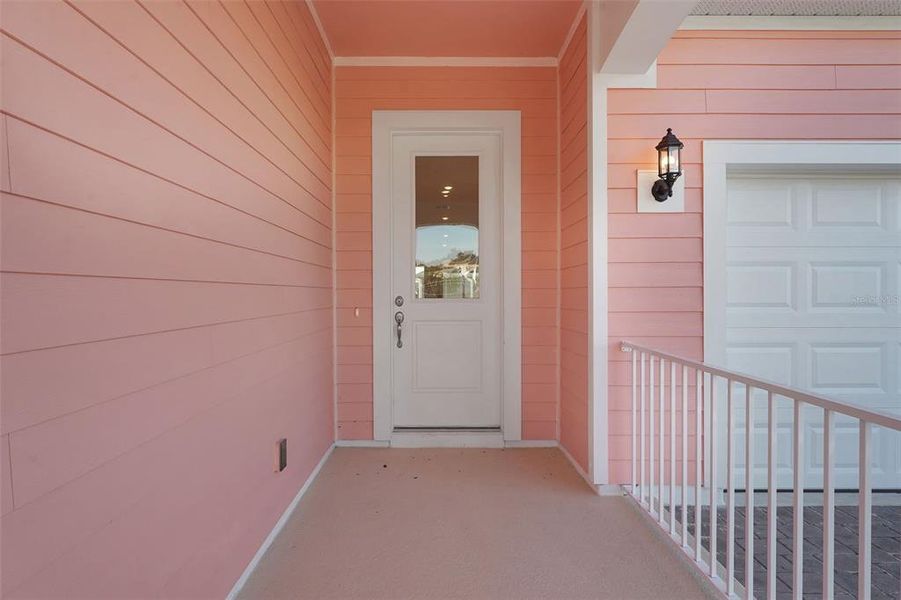 Exterior details and patio area of a home in Green Key Village, Lady Lake (Image 30).