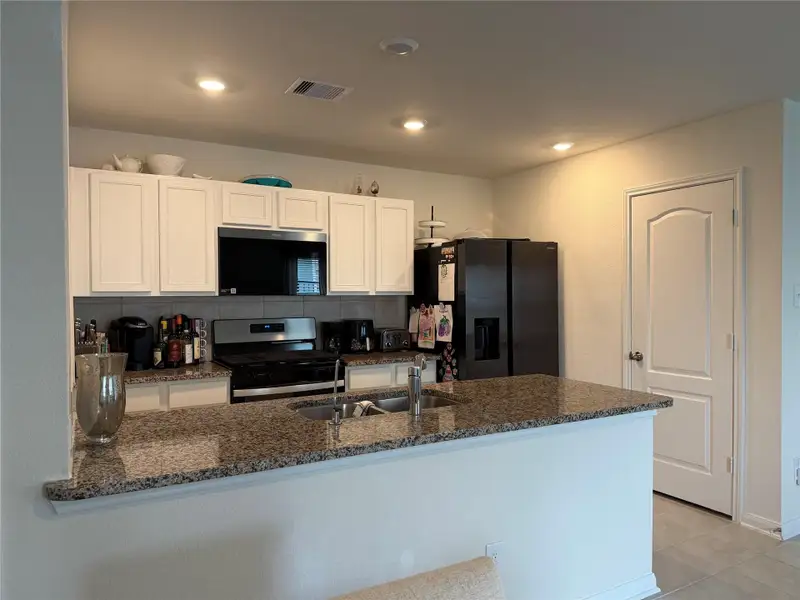 Furnished interior view inside a new home in Sunterra, Katy (Image 10). Furnished interior view inside a new home in Sunterra, Katy (Image 10).