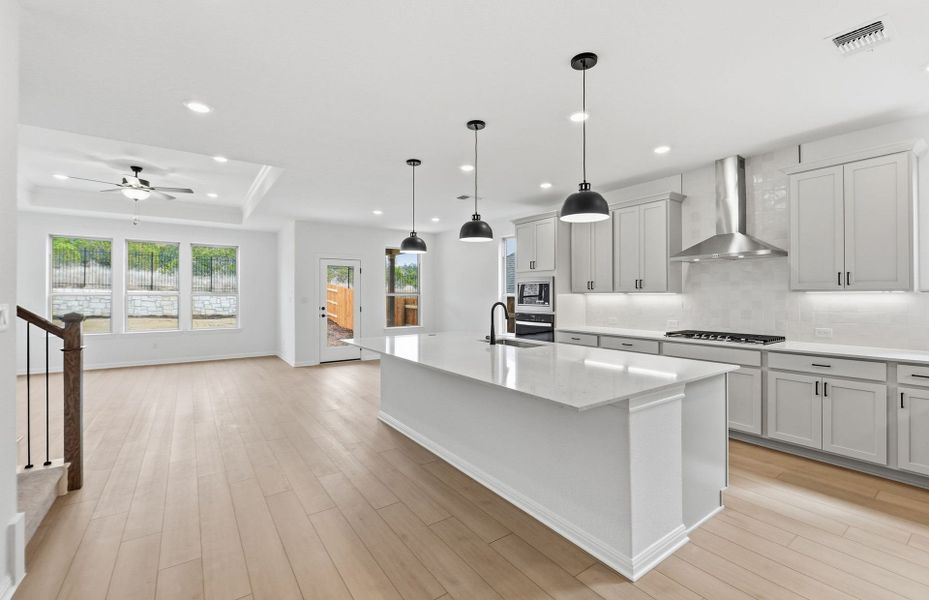 Furnished interior view inside a new home in West Cypress Hills, Spicewood (Image 13).